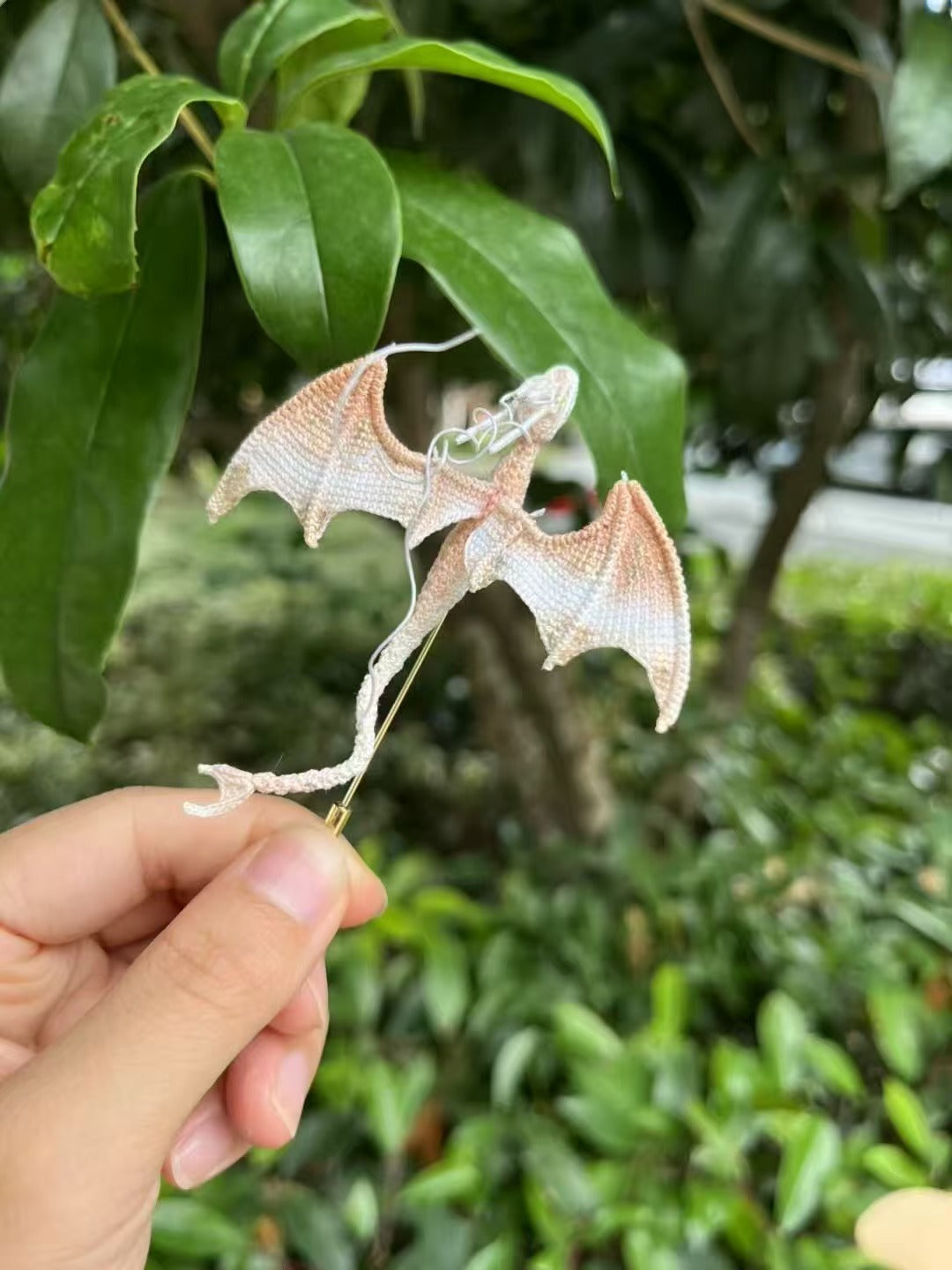 micro crochet dragon brooch