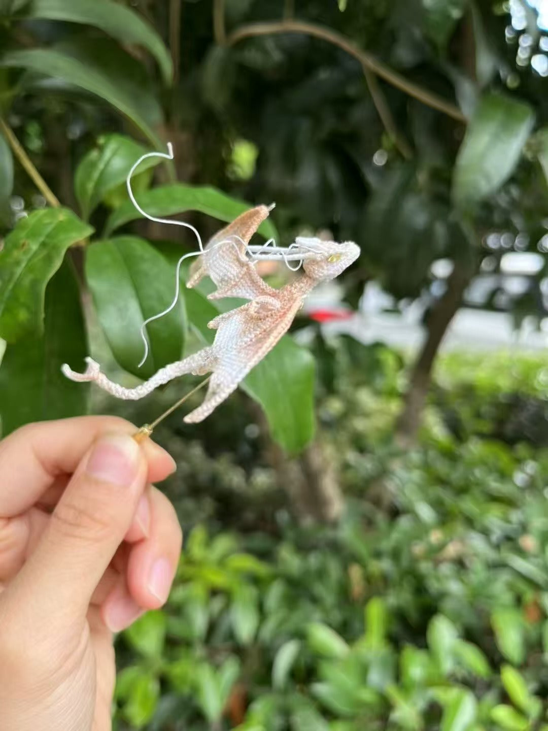 micro crochet dragon brooch